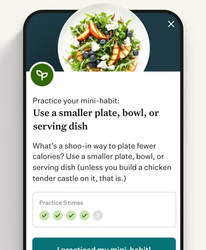 Noom app showing healthy eating tips and a salad