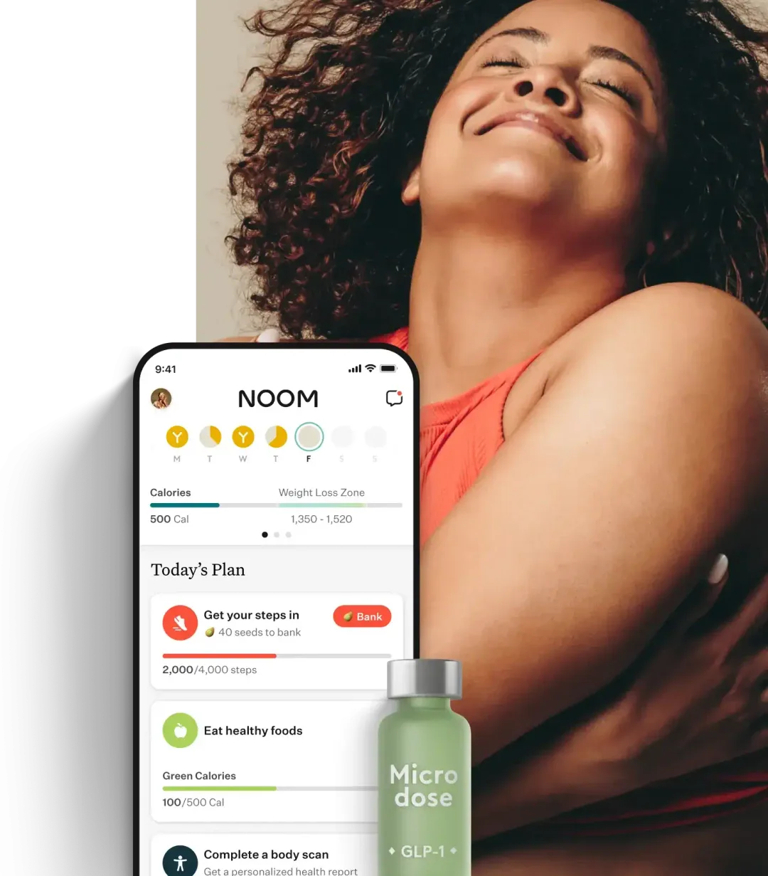 woman smiling with a noom vial, orange pill, and the noom app </p>
<p>